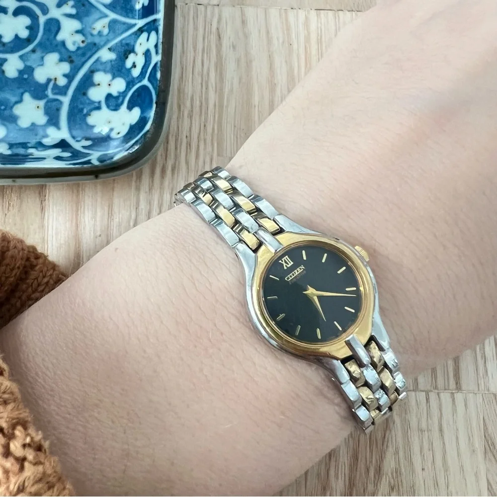 Citizen eco drive ladies black dial two tone dress solar watch